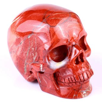 5cm red jasper crystal skull front view white background deep red polished natural stone